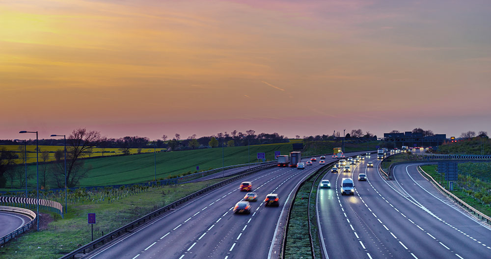 sunset over english motorway